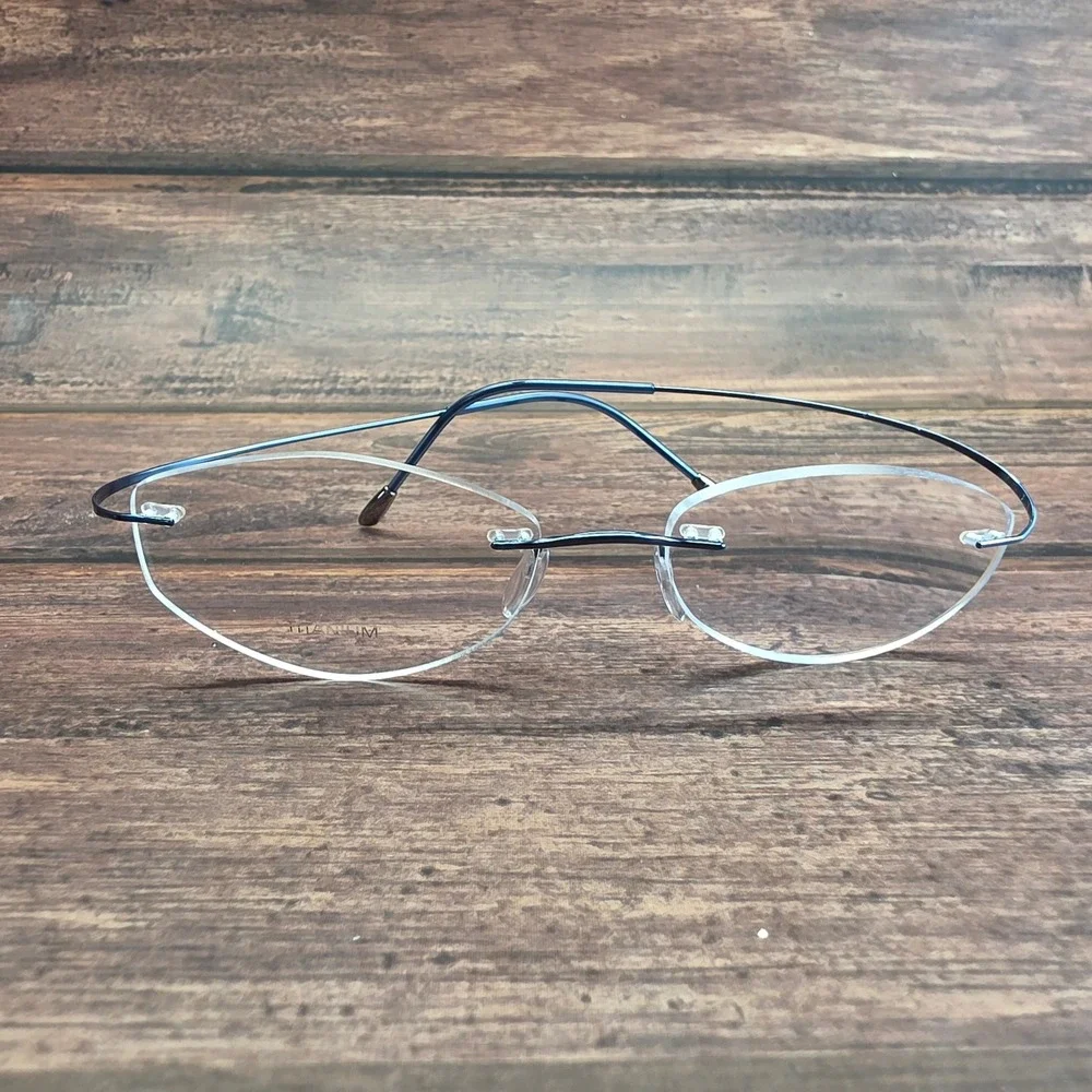 Silhouette Titan Blue Rimless Titanium Eyeglasses Oval Minimalist 4061